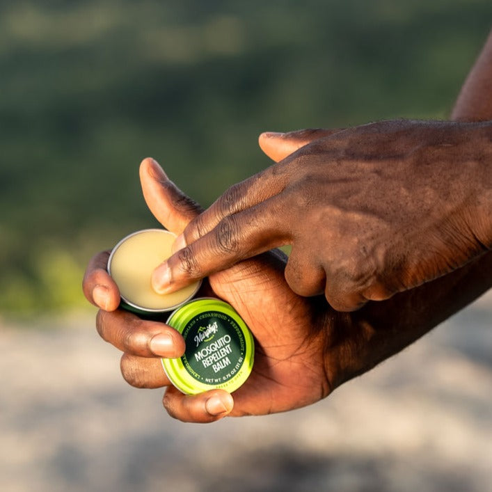 Mosquito Repellent Balm being applied