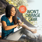 A woman spraying her arm with Lemon Eucalyptus Oil Spray. Text says, DEET free, Won't damage gear. A tent is in the background.