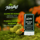 Murphy's Naturals Bite Relief Balm with natural ingredients on a green background