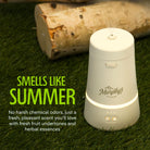 Mosquito Repellent Device with light strip llit up sitting on grass with wood logs behind it. Text reading, "smells like summer. No harsh chemical odors, just a fresh, pleasant scent you'll love with gresh fruit undertones and herbal essences.